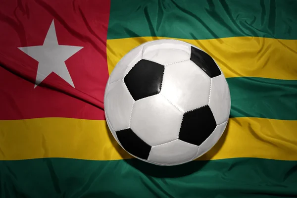 Black and white football ball on the national flag of togo — Stock Photo, Image