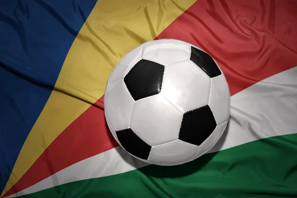 Black and white football ball on the national flag of seychelles — Stock Photo, Image