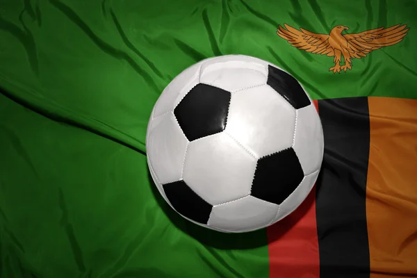 Zwartwit Voetbal bal op de nationale vlag van zambia — Stockfoto