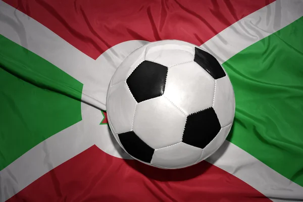 Zwartwit Voetbal bal op de nationale vlag van burundi — Stockfoto