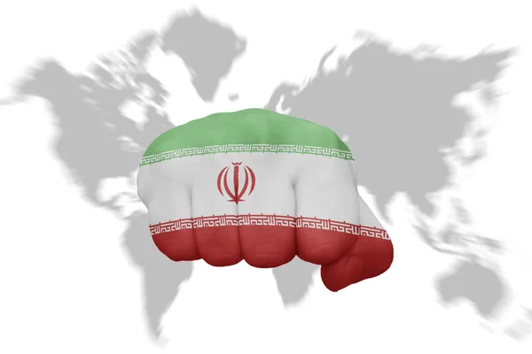 与在世界地图背景上的伊朗国旗拳 — 图库照片