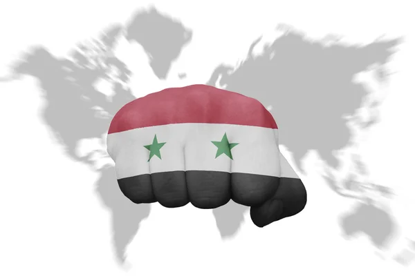 Fist with the national flag of syria on a world map background — Stock Photo, Image
