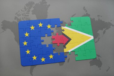 bir dünya haritası üzerinde guyana ve Avrupa Birliği'nin ulusal bayrakla bulmaca