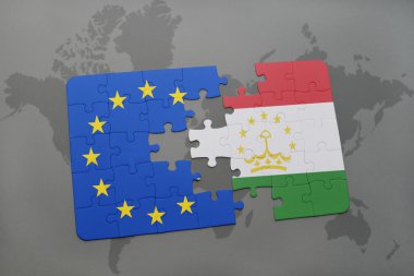 bir dünya haritası üzerinde Tacikistan ve Avrupa Birliği'nin ulusal bayrakla bulmaca