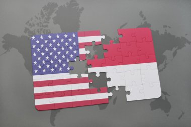 Amerika Birleşik Devletleri ve Endonezya ulusal bayrak dünya harita arka plan üzerinde ile bulmaca