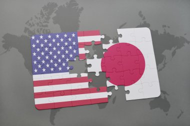 Amerika Birleşik Devletleri ve Japonya dünya harita arka plan üzerinde bayrağı ile bulmaca