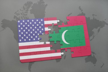 Dünya harita arka plan üzerinde Amerika Birleşik Devletleri ve Maldivler bayrağının Ulusal bulmaca