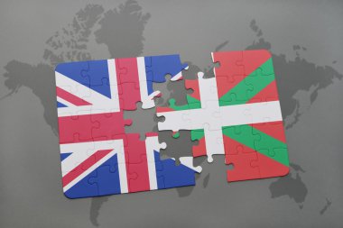 Büyük Britanya ve dünya harita arka plan üzerinde Bask Ülkesi bayrağı ile bulmaca