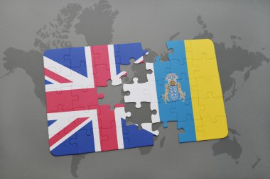 Büyük Britanya ve Kanarya Adaları ulusal bayrak dünya harita arka plan üzerinde ile bulmaca