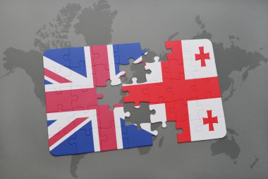 Büyük Britanya ve Gürcistan ulusal bayrak dünya harita arka plan üzerinde ile bulmaca