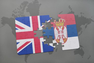 Büyük Britanya ve Sırbistan ulusal bayrak dünya harita arka plan üzerinde ile bulmaca