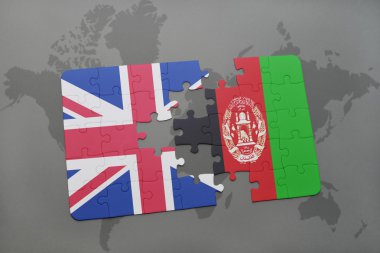 bir dünya haritası arka plan üzerinde büyük Britanya ve Afganistan ulusal bayrağı ile bulmaca.