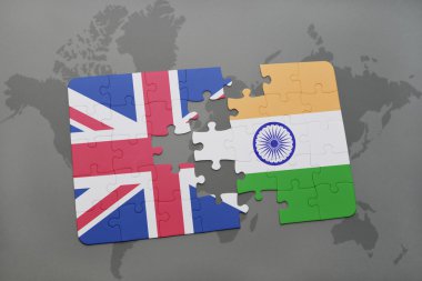 bir dünya haritası arka plan üzerinde büyük Britanya ve Hindistan ulusal bayrağı ile bulmaca.