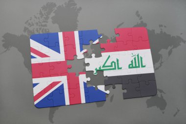 bir dünya haritası arka plan üzerinde büyük Britanya ve Irak ulusal bayrağı ile bulmaca.