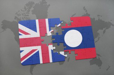 bir dünya haritası arka plan üzerinde büyük Britanya ve laos ulusal bayrağı ile bulmaca.