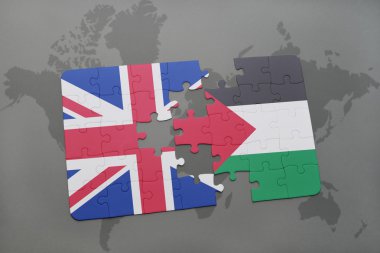 bir dünya haritası arka plan üzerinde büyük Britanya ve Filistin ulusal bayrağı ile bulmaca.