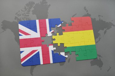 bir dünya haritası arka plan üzerinde büyük Britanya ve Bolivya ulusal bayrağı ile bulmaca.