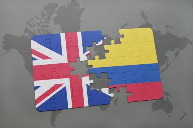 bir dünya haritası arka plan üzerinde büyük Britanya ve Kolombiya ulusal bayrağı ile bulmaca.