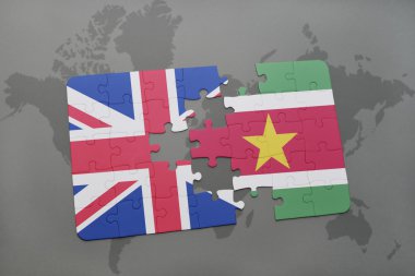 Büyük Britanya ve Surinam ulusal bayrak dünya harita arka plan üzerinde ile bulmaca.