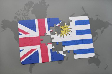 Büyük Britanya ve uruguay ulusal bayrak dünya harita arka plan üzerinde ile bulmaca.