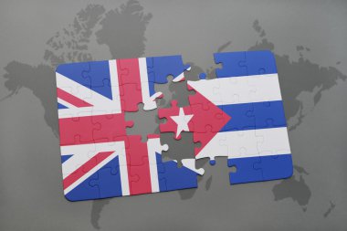 Büyük Britanya ve Küba ulusal bayrak dünya harita arka plan üzerinde ile bulmaca.