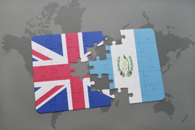 Büyük Britanya ve guatemala ulusal bayrak dünya harita arka plan üzerinde ile bulmaca.