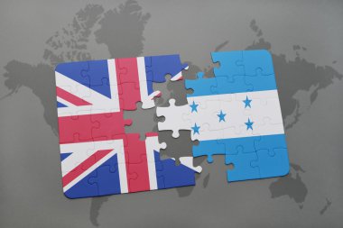 Büyük Britanya ve honduras ulusal bayrak dünya harita arka plan üzerinde ile bulmaca.
