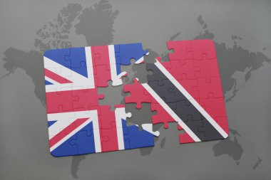 Büyük Britanya ve trinidad ve tobago dünya harita arka plan üzerinde bayrağı ile bulmaca.