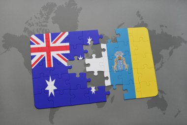 Avustralya ve Kanarya Adaları ulusal bayrak dünya harita arka plan üzerinde ile bulmaca.
