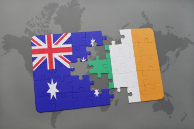 Avustralya ve İrlanda ulusal bayrak dünya harita arka plan üzerinde ile bulmaca.