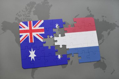 Avustralya ve Hollanda ulusal bayrak dünya harita arka plan üzerinde ile bulmaca.
