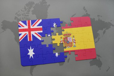 Avustralya ve İspanya Dünya harita arka plan üzerinde bayrağı ile bulmaca.