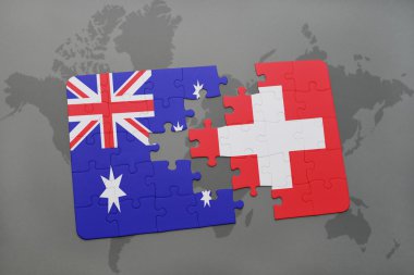 Avustralya ve İsviçre ulusal bayrak dünya harita arka plan üzerinde ile bulmaca.