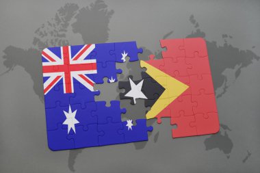 bir dünya haritası arka plan üzerinde Avustralya ve doğu timor ulusal bayrağı ile bulmaca.