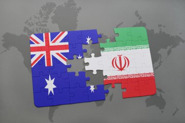 bir dünya haritası arka plan üzerinde Avustralya ve İran ulusal bayrağı ile bulmaca.
