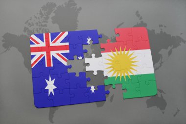 bir dünya haritası arka plan üzerinde Avustralya ve Kürdistan ulusal bayrağı ile bulmaca.