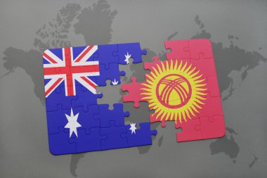 bir dünya haritası arka plan üzerinde Avustralya ve Kırgızistan ulusal bayrağı ile bulmaca.