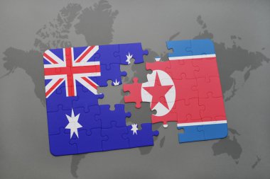 bir dünya haritası arka plan üzerinde Avustralya ve Kuzey Kore ulusal bayrağı ile bulmaca.