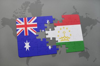 bir dünya haritası arka plan üzerinde Avustralya ve Tacikistan ulusal bayrağı ile bulmaca.