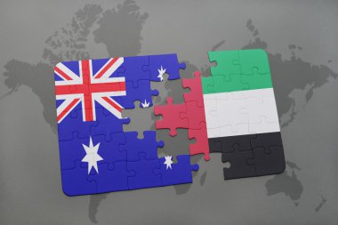 bir dünya haritası arka plan üzerinde Avustralya ve Birleşik Arap Emirlikleri ulusal bayrağı ile bulmaca.