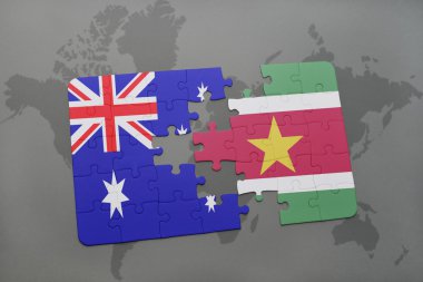Avustralya ve Surinam ulusal bayrak dünya harita arka plan üzerinde ile bulmaca.