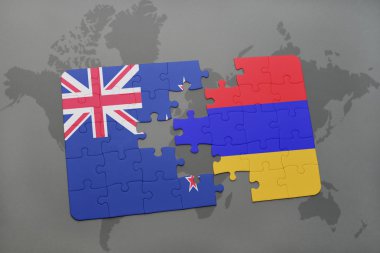 bir dünya haritası arka plan üzerinde Yeni Zelanda ve Ermenistan ulusal bayrağı ile bulmaca