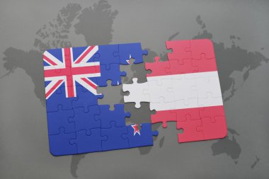 bir dünya haritası arka plan üzerinde Yeni Zelanda ve Avusturya ulusal bayrağı ile bulmaca