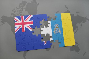 bir dünya haritası arka plan üzerinde Yeni Zelanda ve kanarya adalarıulusal bayrağı ile bulmaca