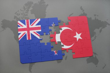 Yeni Zelanda ve Türkiye Dünya harita arka plan üzerinde bayrağı ile bulmaca