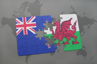 Yeni Zelanda ve dünya harita arka plan üzerinde Galler Ulusal bayrak ile bulmaca