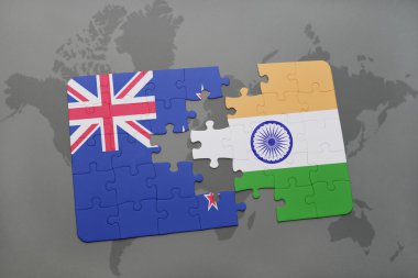 bir dünya haritası arka plan üzerinde Yeni Zelanda ve Hindistan ulusal bayrağı ile bulmaca. 3d illüstrasyon