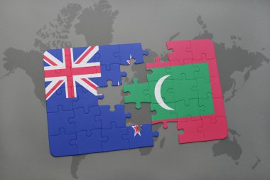 bir dünya haritası arka plan üzerinde Yeni Zelanda ve Maldivler ulusal bayrağı ile bulmaca. 3d illüstrasyon