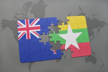 bir dünya haritası arka plan üzerinde Yeni Zelanda ve Myanmar ulusal bayrağı ile bulmaca. 3d illüstrasyon