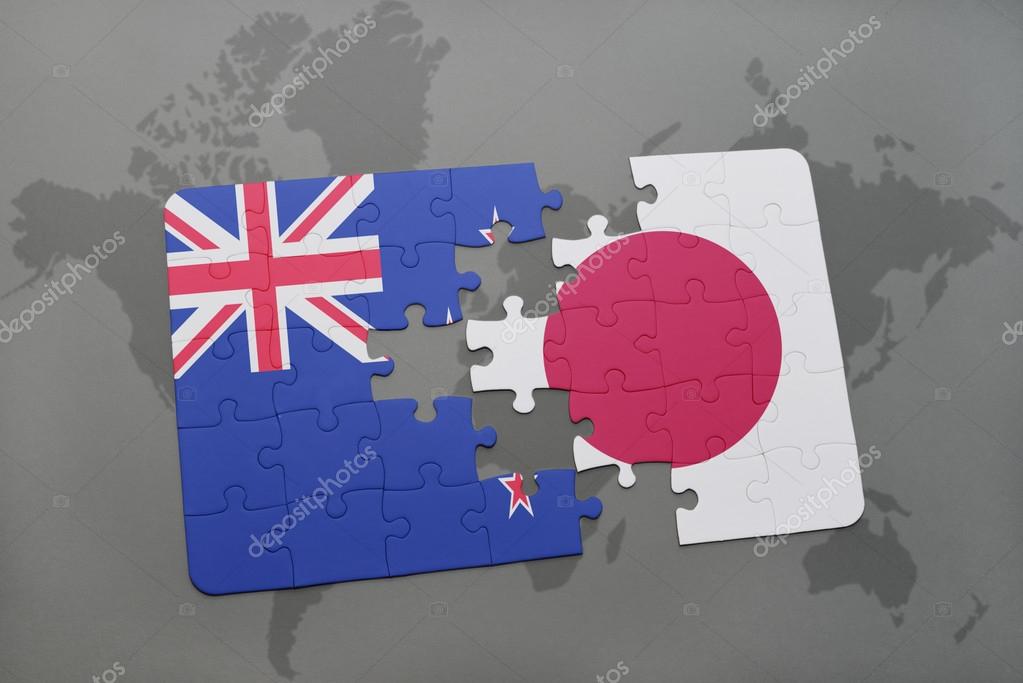 Puzzle with the national flag of new zealand and japan on a world map background. 3D